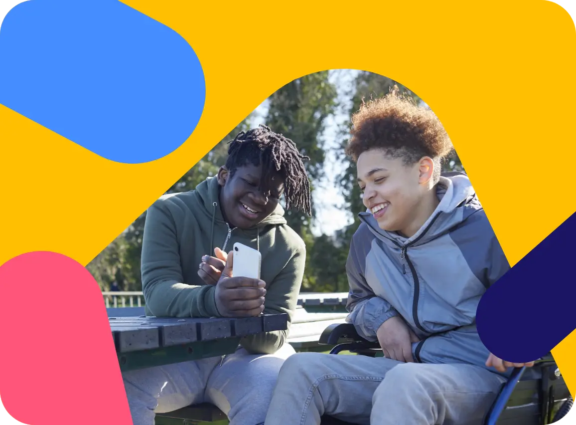 A young lady smiling and using a coloured abacus